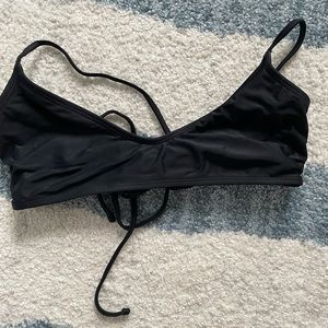 Black bikini top with detailing in back